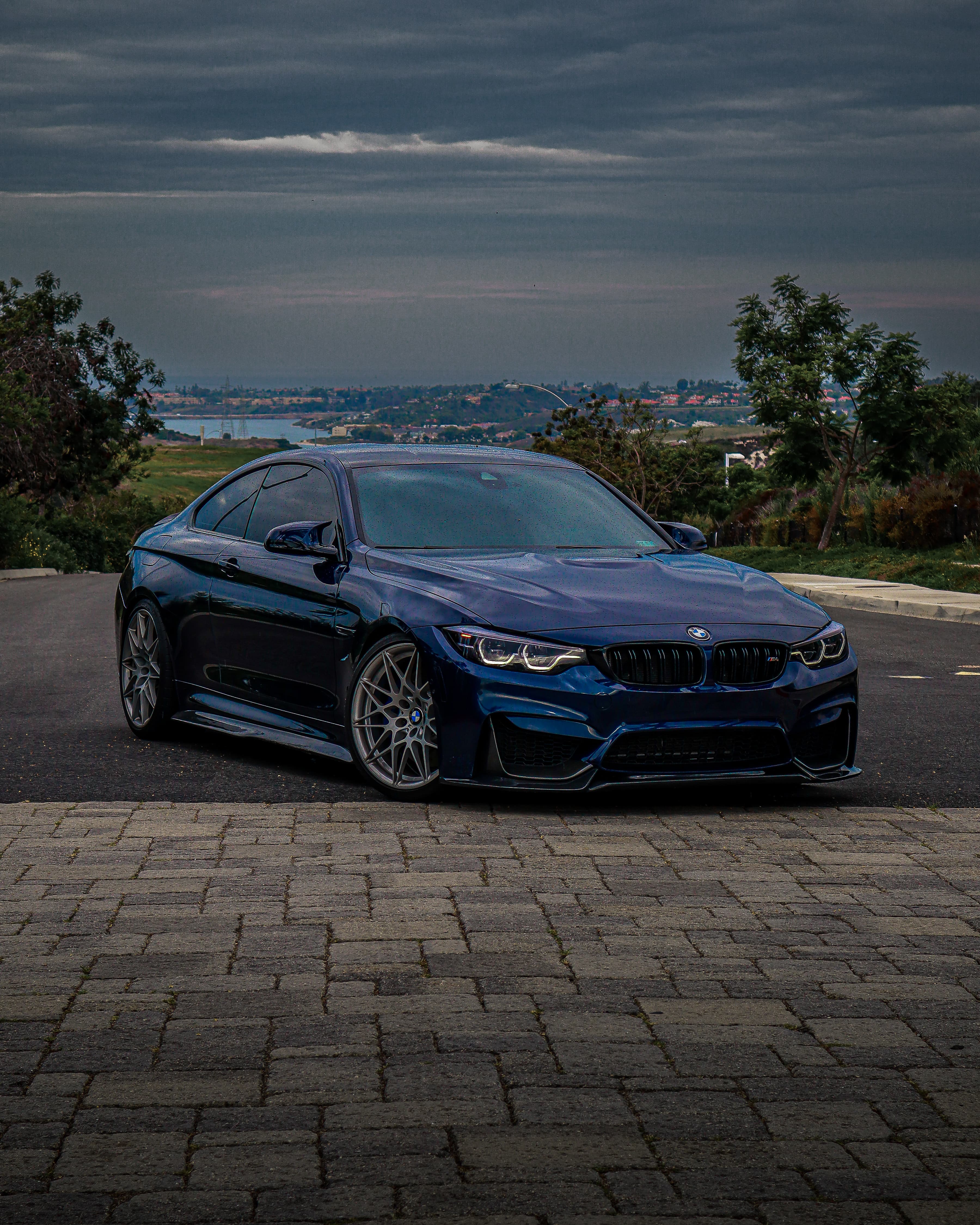 BMW M4 with dramatic stormy sky - signature ScopedLife shot