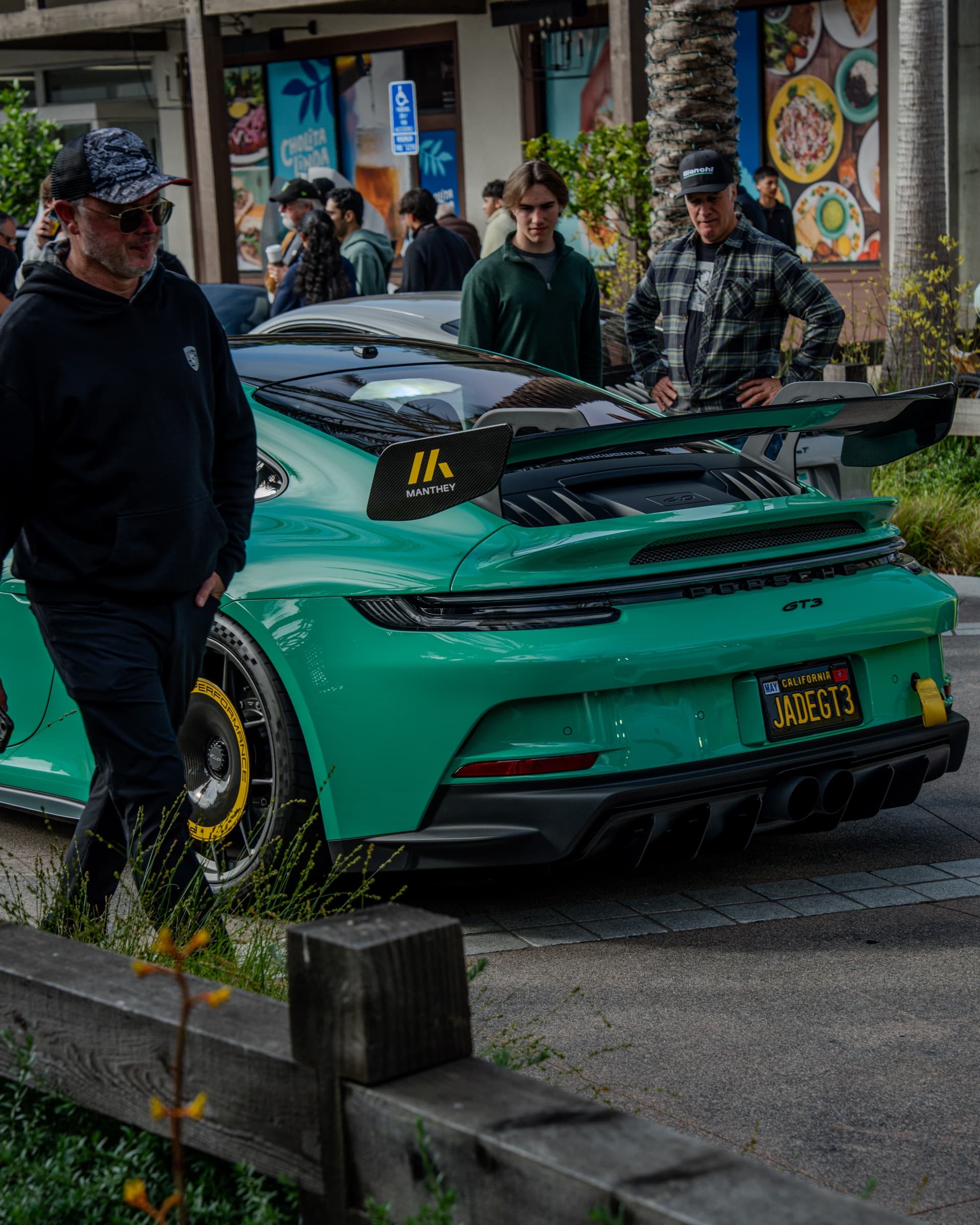 Jade green Porsche 992 GT3 with Manthey aero